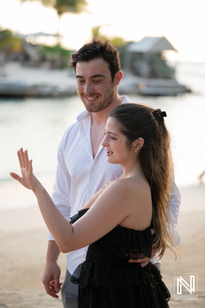Couple shares a special moment during a wedding proposal at Baoase Luxury Resort