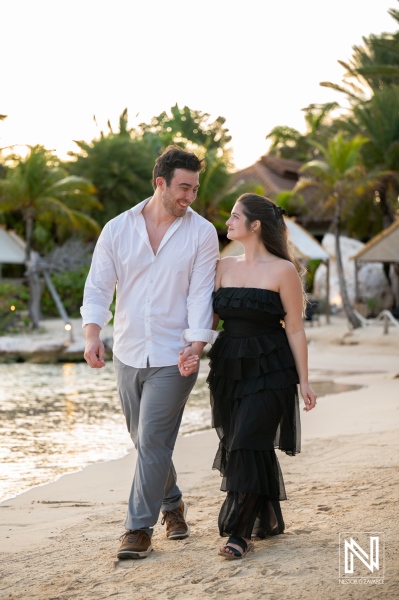 Couple walks on the beach during a wedding proposal at Baoase Luxury Resort in Curacao