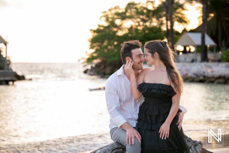 Couple enjoys a wedding proposal at Baoase Luxury Resort in Curacao during sunset