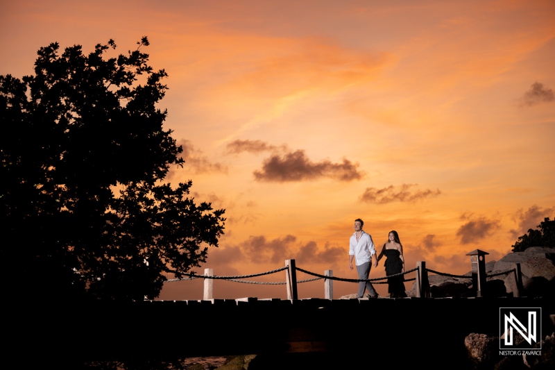 Couple walks hand in hand during wedding proposal at Baoase Luxury Resort in Curacao