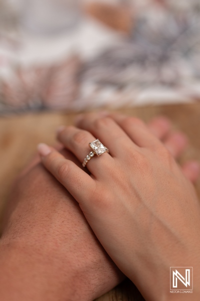 Wedding proposal at Baoase Luxury Resort in Curacao with an engagement ring and two hands showing love