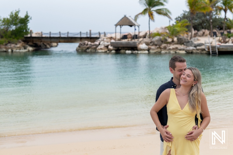 Romantic wedding proposal at sunset on the beach of Baoase Luxury Resort in Curacao, surrounded by stunning ocean views and tranquil ambiance