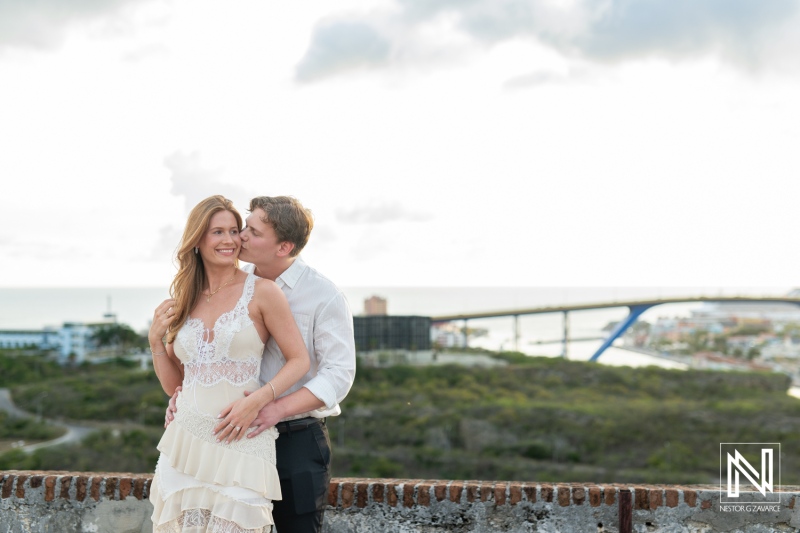 Wedding proposal at Fort Nassau in Curacao captures a joyful moment between two people surrounded by nature