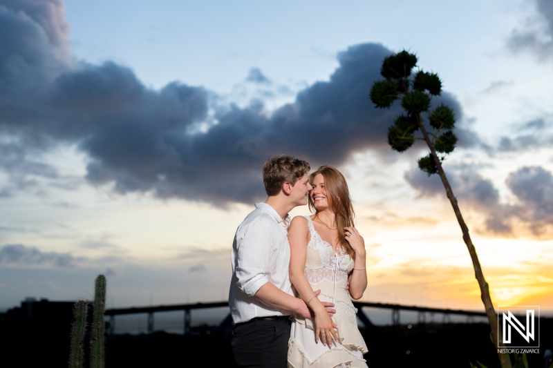 Wedding proposal at Fort Nassau in Curacao during sunset with couple sharing a moment together