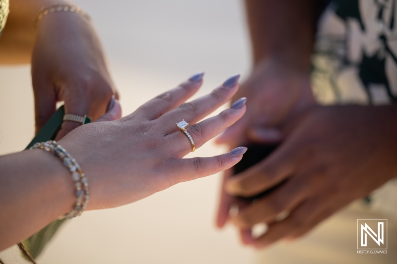 Wedding proposal at Avila Beach Hotel in Curacao during sunset