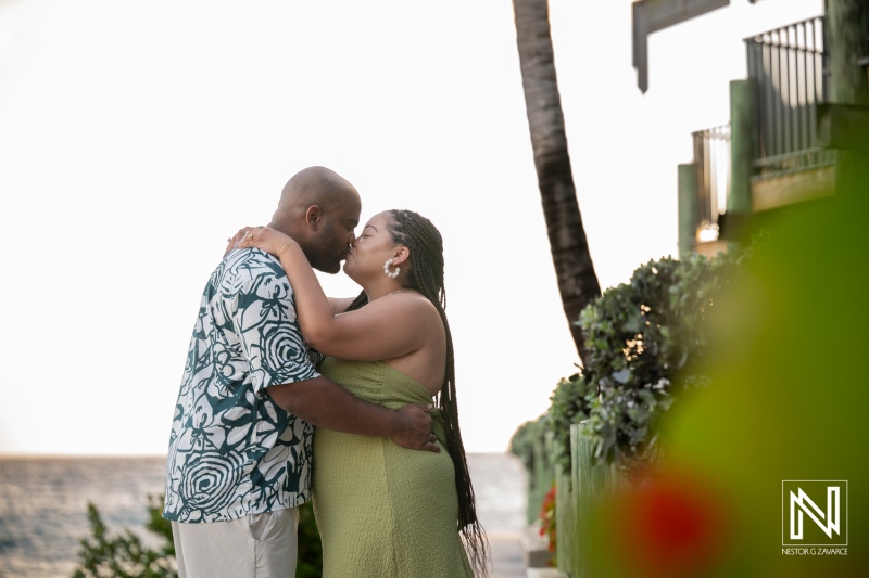 Couple shares a special moment during a wedding proposal at Avila Beach Hotel in Curacao