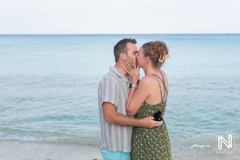 Romantic wedding proposal at Daaibooi Beach during a beautiful sunrise in Curacao
