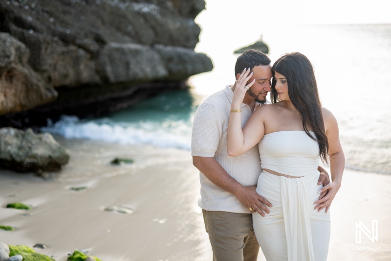 Wedding proposal at Daaibooi Beach in Curacao during sunset