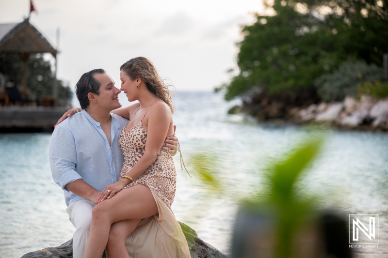 Couple shares a romantic moment during wedding proposal at Baoase Luxury Resort in Curacao near the ocean