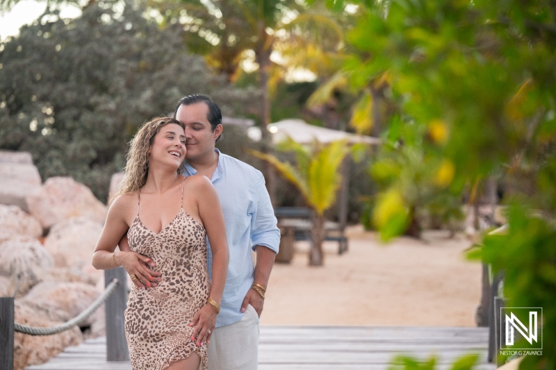 Couple enjoys romantic moment during wedding proposal at Baoase Luxury Resort in Curacao during sunset