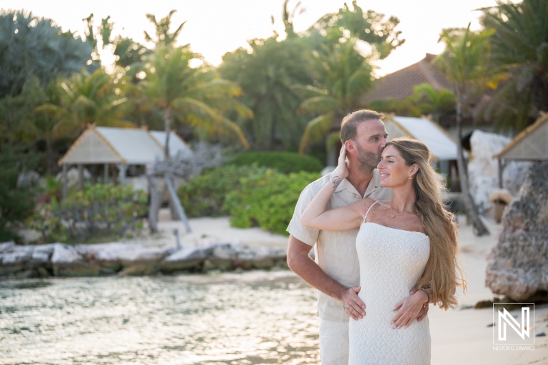 Couple enjoys a wedding proposal at Baoase Luxury Resort in Curacao by the water