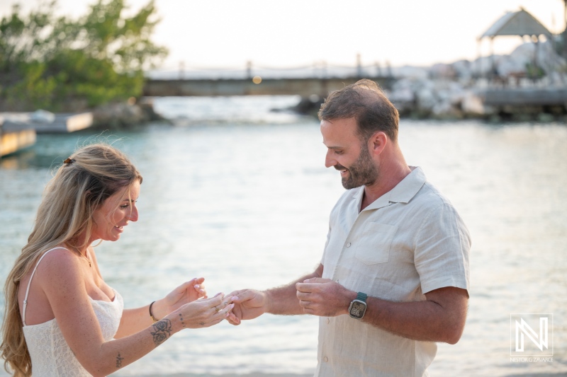 Couple enjoys wedding proposal at Baoase Luxury Resort in Curacao during sunset