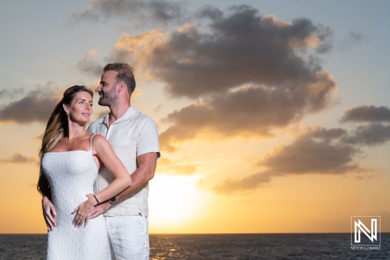 Couple celebrates wedding proposal during sunset at Baoase Luxury Resort in Curacao