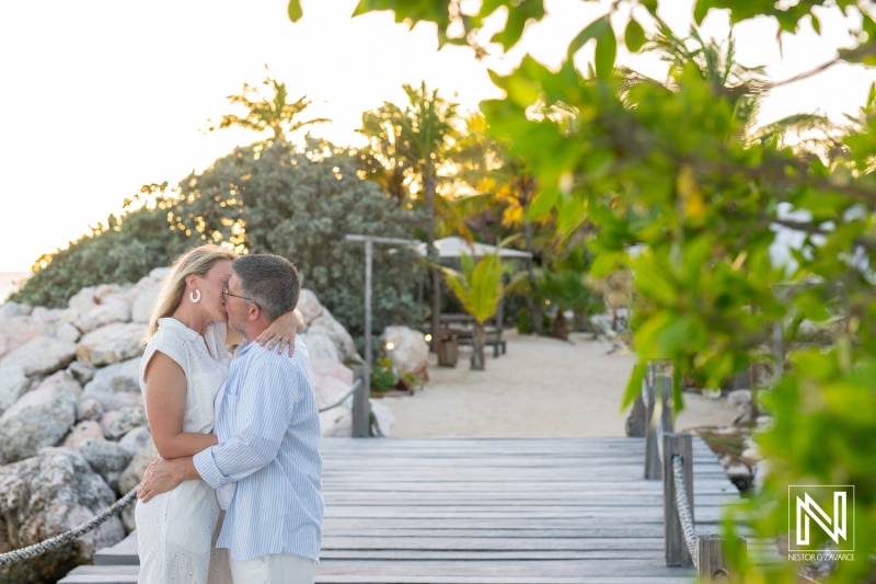 Couple shares a memorable wedding proposal at Baoase Luxury Resort in Curacao during sunset by the beach