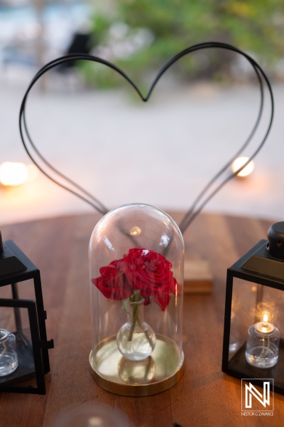 Wedding proposal at Baoase Luxury Resort in Curacao with a heart display and red roses