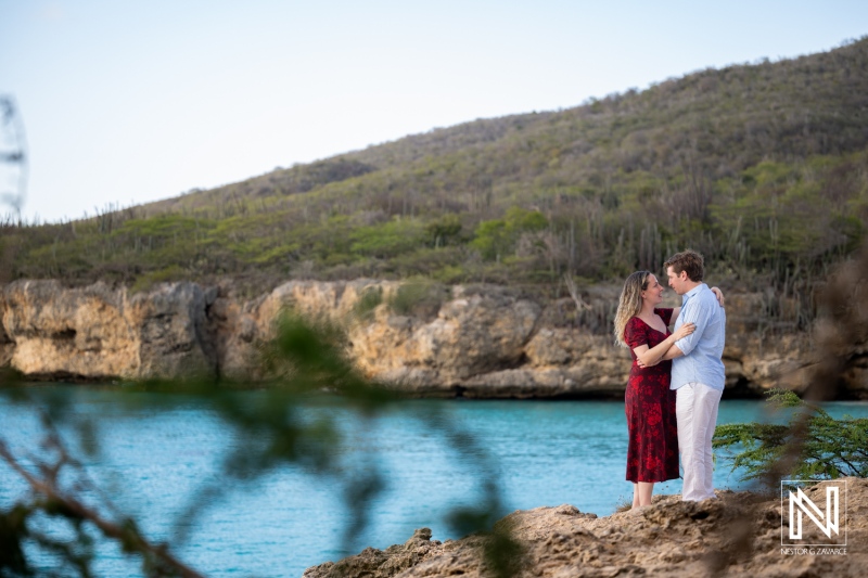 Wedding proposal at Knip in Curacao near the water with a couple celebrating
