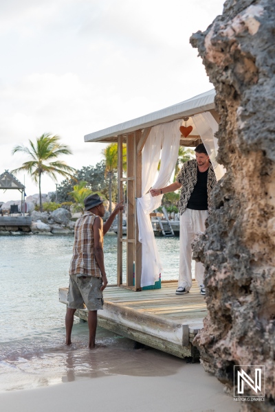 Unique wedding proposal at sunset in a romantic setting by the water at Baoase Luxury Resort in Curacao