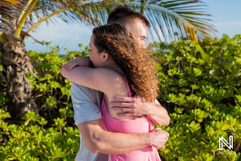 Boy and girl give each other a hug