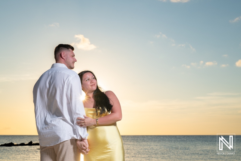 Romantic wedding proposal at sunset on Curacao beach near Marriott Beach Resort