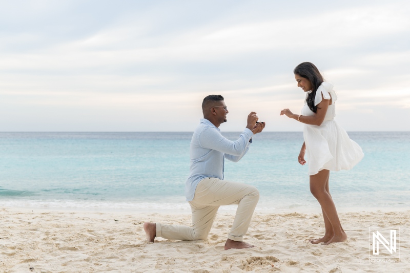 Wedding proposal at Cas Abao Beach in Curacao during sunset by the sea