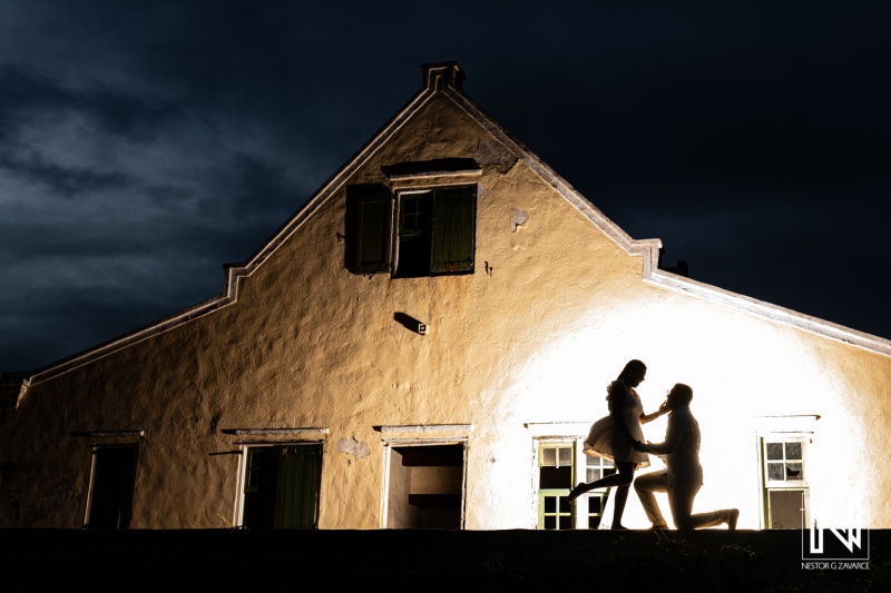 Couple celebrates wedding proposal at Cas Abao Beach in Curacao during sunset