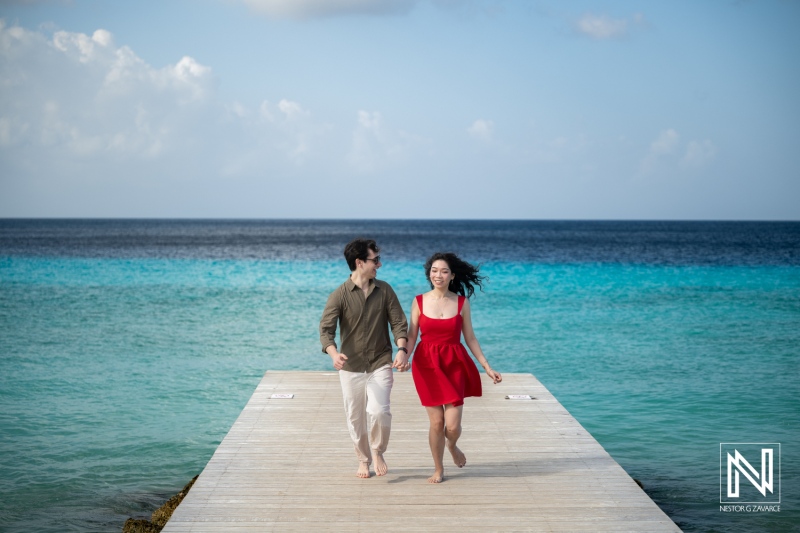 Couple shares special moment during wedding proposal at Playa Porto Mari in Curacao