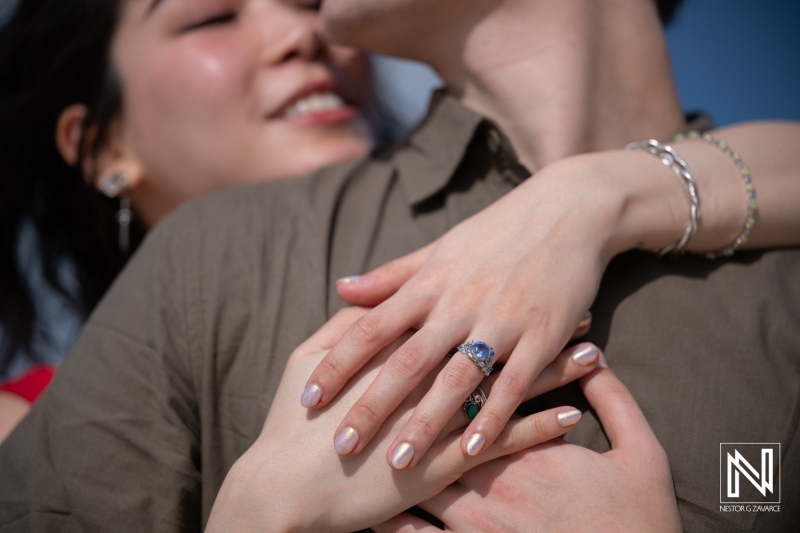 Couple shares a special moment during a wedding proposal at Playa Porto Mari in Curacao