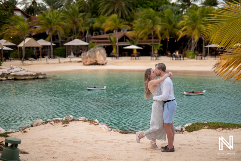 Couple enjoys wedding proposal at Baoase Luxury Resort in Curacao near the water