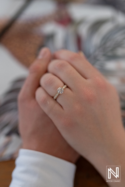 Couple shares a special moment during a wedding proposal at Baoase Luxury Resort in Curacao