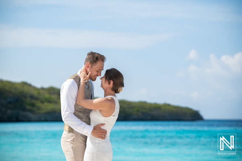 Couple enjoys a trash the dress session at Cas Abao Beach in Curacao on a sunny day