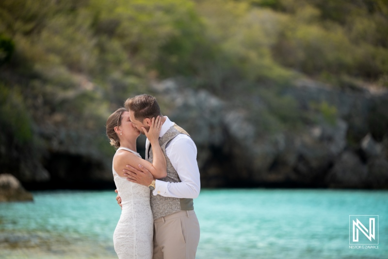 Couple enjoys a trash the dress session at Cas Abao Beach in Curacao during a sunny afternoon