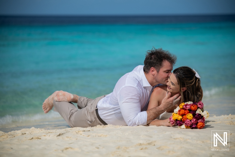 Trash the dress session at Cas Abao Beach in Curacao with couple enjoying time by the water