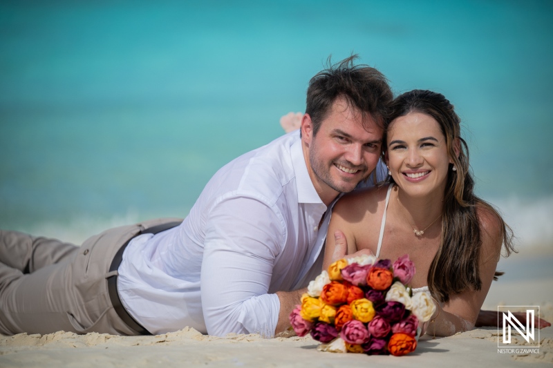 Couple enjoys trash the dress session at Cas Abao Beach in Curacao celebrating their love by the ocean