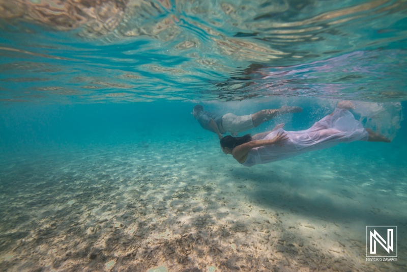 Unique underwater wedding dress experience at Cas Abao Beach in Curacao during a Trash the Dress photoshoot