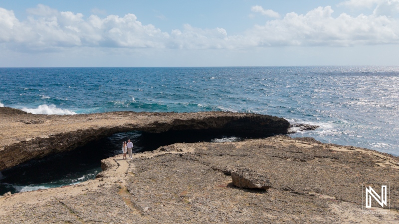 Trash the dress session at Shete Boka National Park showcases stunning ocean scenery in Curacao under bright skies