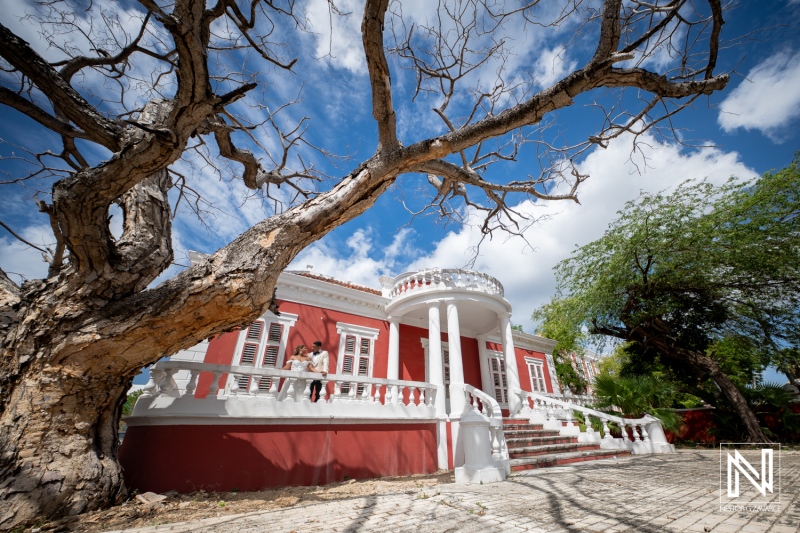 Beautiful trash the dress session in Curacao showcasing stunning architecture and vibrant landscapes