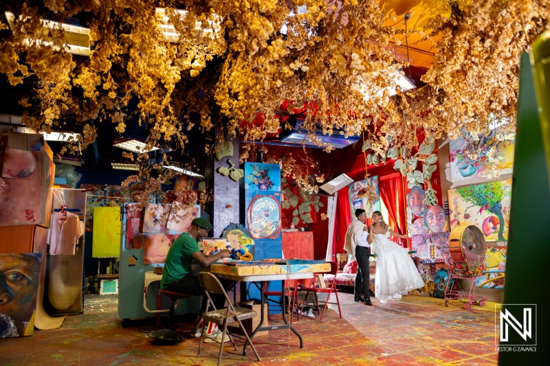 Treasure the memories in Curacao during a colorful Trash the Dress session with artistic backgrounds and vibrant decorations