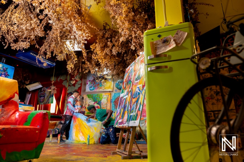 Colorful post-wedding Trash the Dress session in Curacao showcasing vibrant art and creative expression