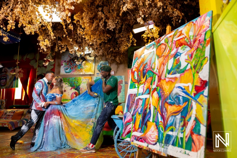 Colorful trash the dress session in Curacao featuring vibrant art and playful moments after a wedding ceremony