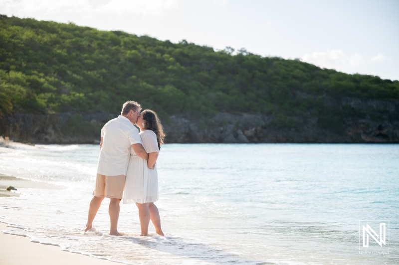 Couple enjoying trash the dress photoshoot at Cas Abao Beach in Curacao during sunny day