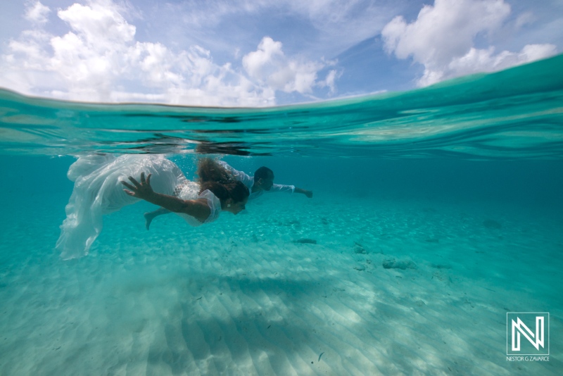 Trash the Dress underwater photoshoot session at Cas Abao Beach