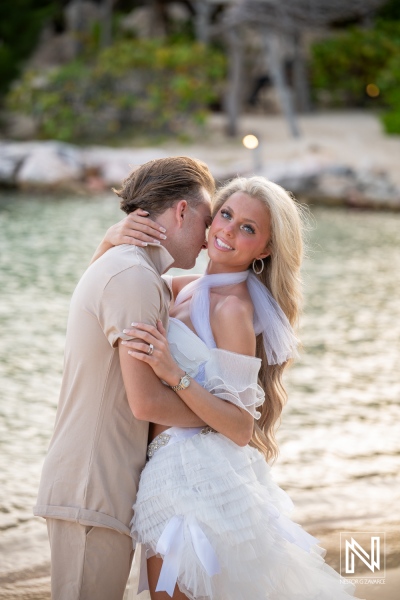 Trash the dress session at Baoase Luxury Resort in Curacao by the beach during sunset with couple enjoying their moment