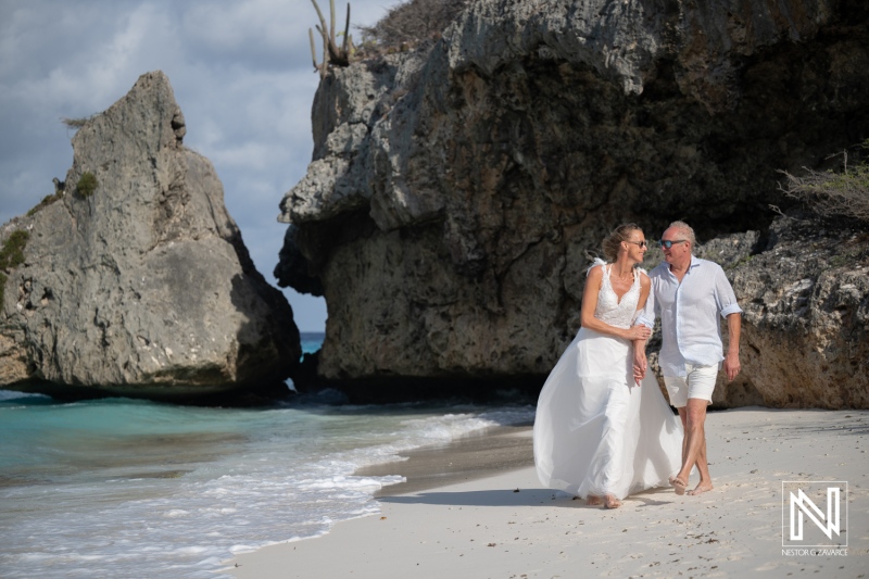 Couple Walking along Cas Abao Beach