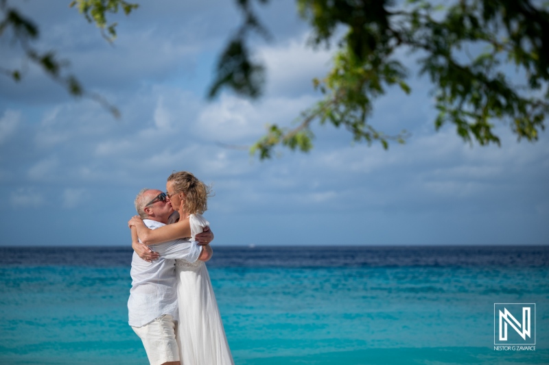 Embrace beside the Turquoise Caribbean Sea