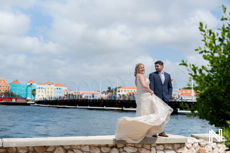 Couple celebrates their love in a stunning Trash the Dress session in Curacao by the beautiful waterfront