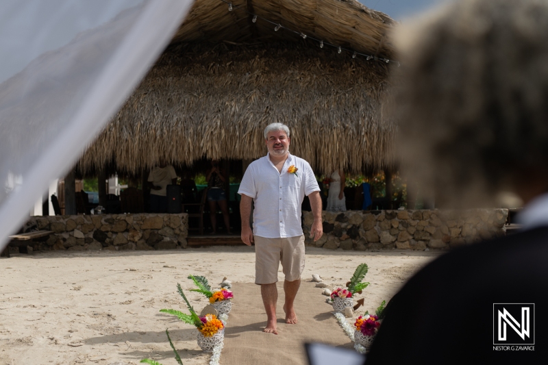Groom walking down the aisle