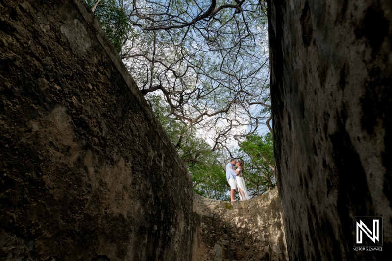 Vow renewal celebration in Curacao amidst historic surroundings capturing love and commitment under a beautiful sky