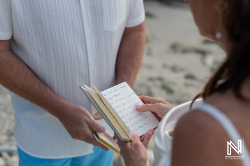 Renewing vows on the beautiful beaches of Curacao during a sunset ceremony with heartfelt promises and personal letters