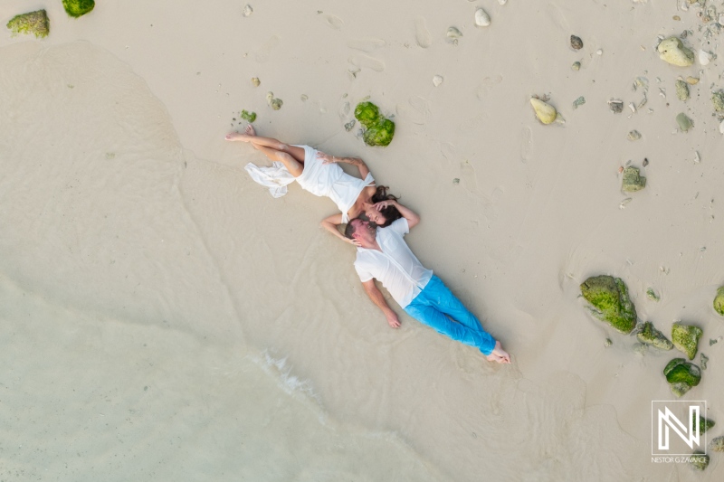 Couple renewing vows on the serene beaches of Curacao during a beautiful daylight ceremony shared with love and joy
