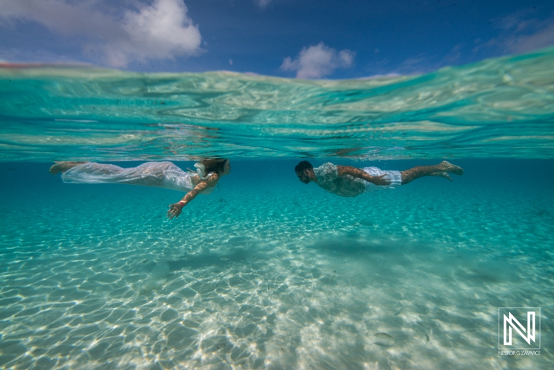 Couple underwater photoshoot at Cas Abao Beach